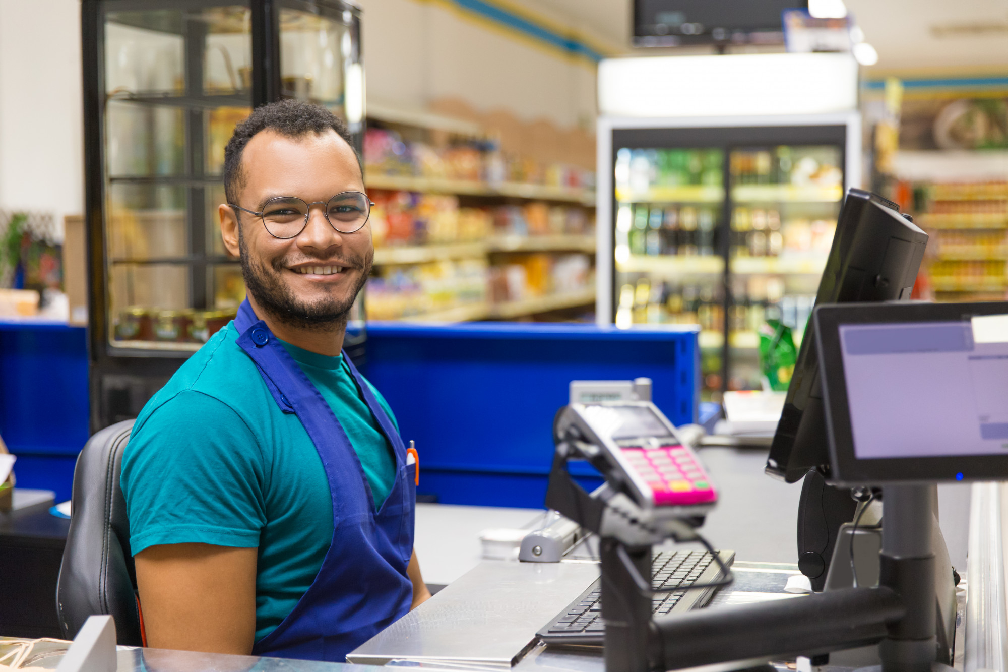 Vibrant cashier smiling