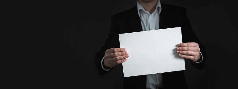 Businessman with Blank Paper