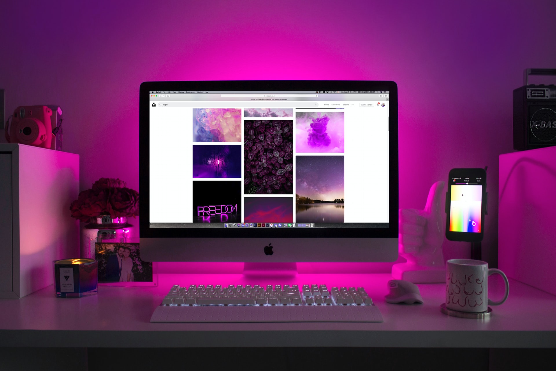 A workstation placed on a purple background