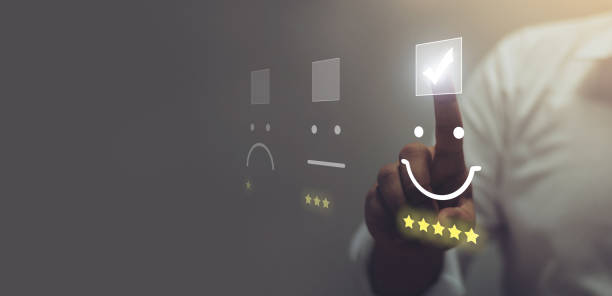 A man touching the checkbox for a happy emoji with five-star feedback