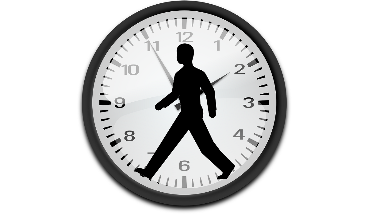 Man Walking Inside Clock