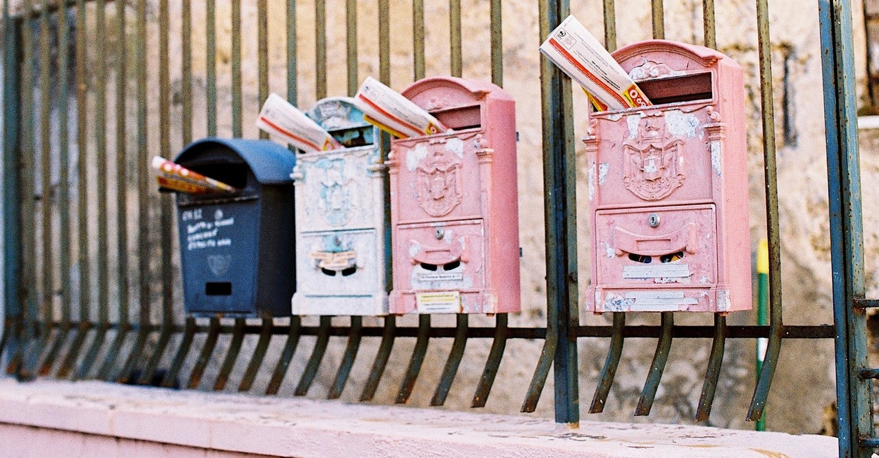 Mailboxes on a gate