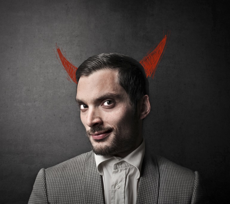 Evil Businessman with Devil Horns Drawn Behind Him