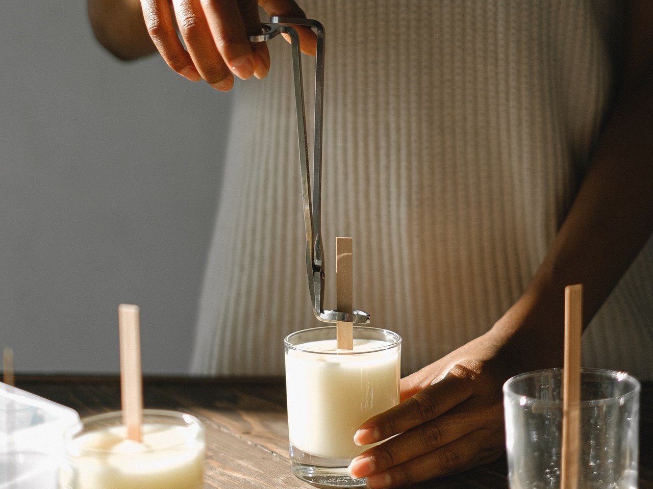 Woman making candles