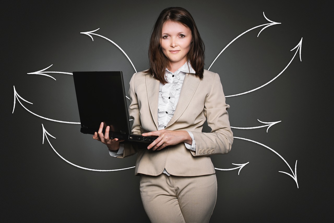 Businesswoman Searching with Laptop