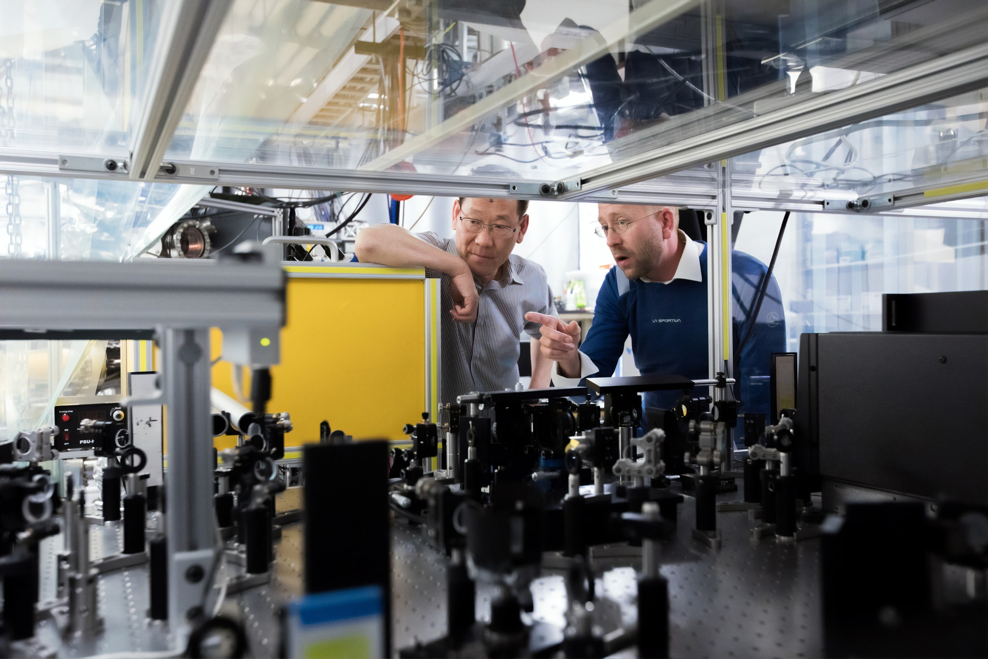 Two men looking at machinery