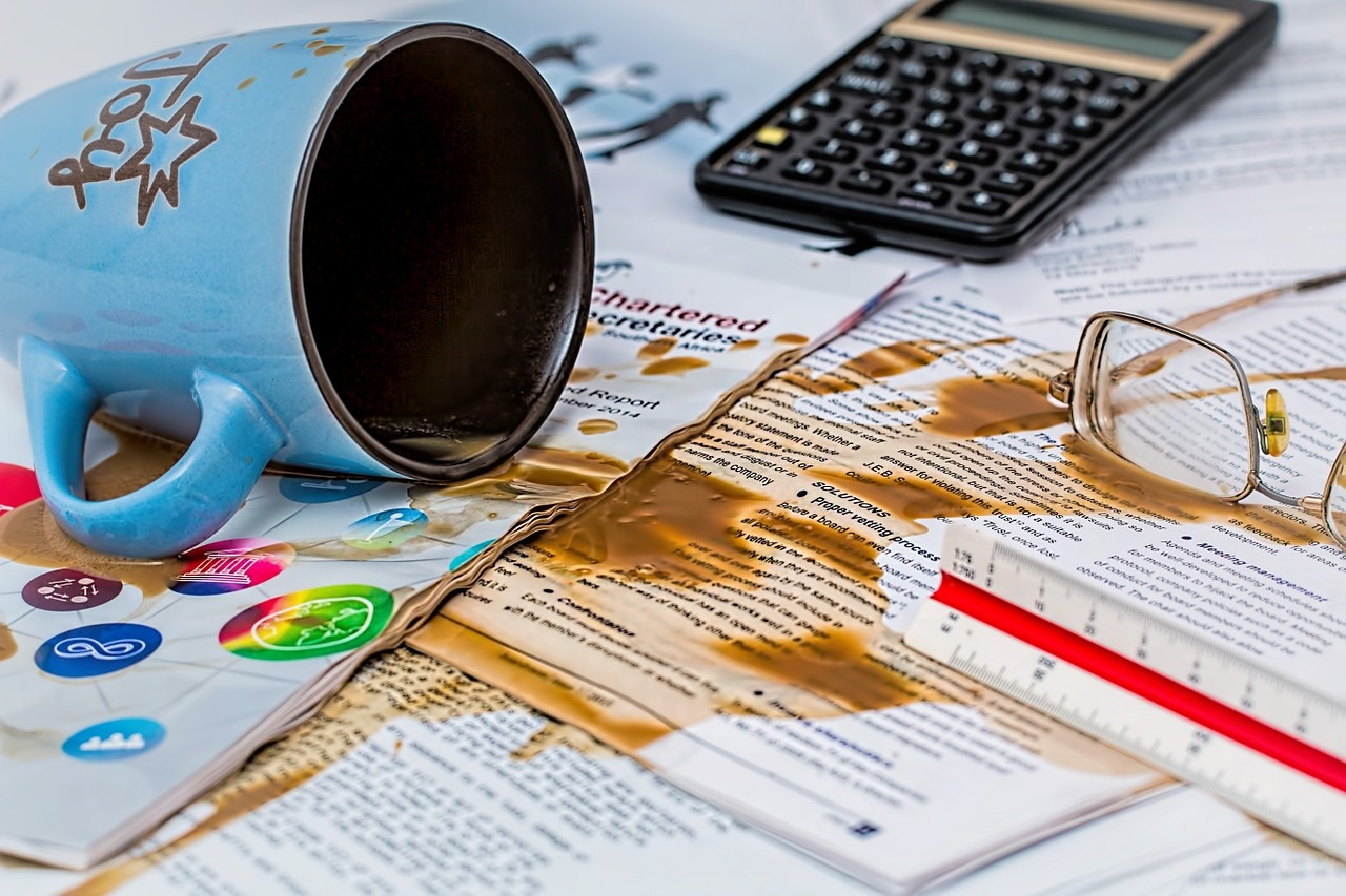 Coffee Spilled on Work Documents