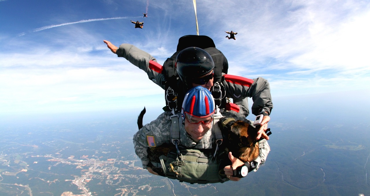 Tandem Skydivers with Dog