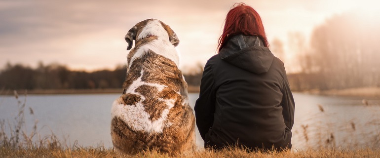 Woman Sitting with Dog